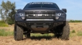 Picture of Addictive Desert Designs 10-14 Ford F-150 Raptor HoneyBadger Front Bumper w- Winch Mount