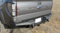 Picture of Addictive Desert Designs 10-14 Ford F-150 Raptor HoneyBadger Rear Bumper w- Tow Hooks