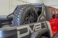 Picture of DV8 Offroad 2019+ Jeep Gladiator Universal Stand Up In-Bed Tire Carrier