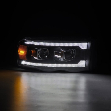 Picture of AlphaRex 02-05 Dodge Ram 1500 LUXX LED Proj Headlights Plank Style Black w-Activ Light-Seq Signal