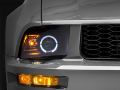 Picture of Raxiom 05-09 Ford Mustang Halogen 2010 Style LED Halo Headlights-Blk HsngClear Lens-Excludes GT500