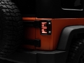 Picture of Raxiom 07-18 Jeep Wrangler JK Axial Series Vision LED Tail Lights- Black Housing Smoked Lens